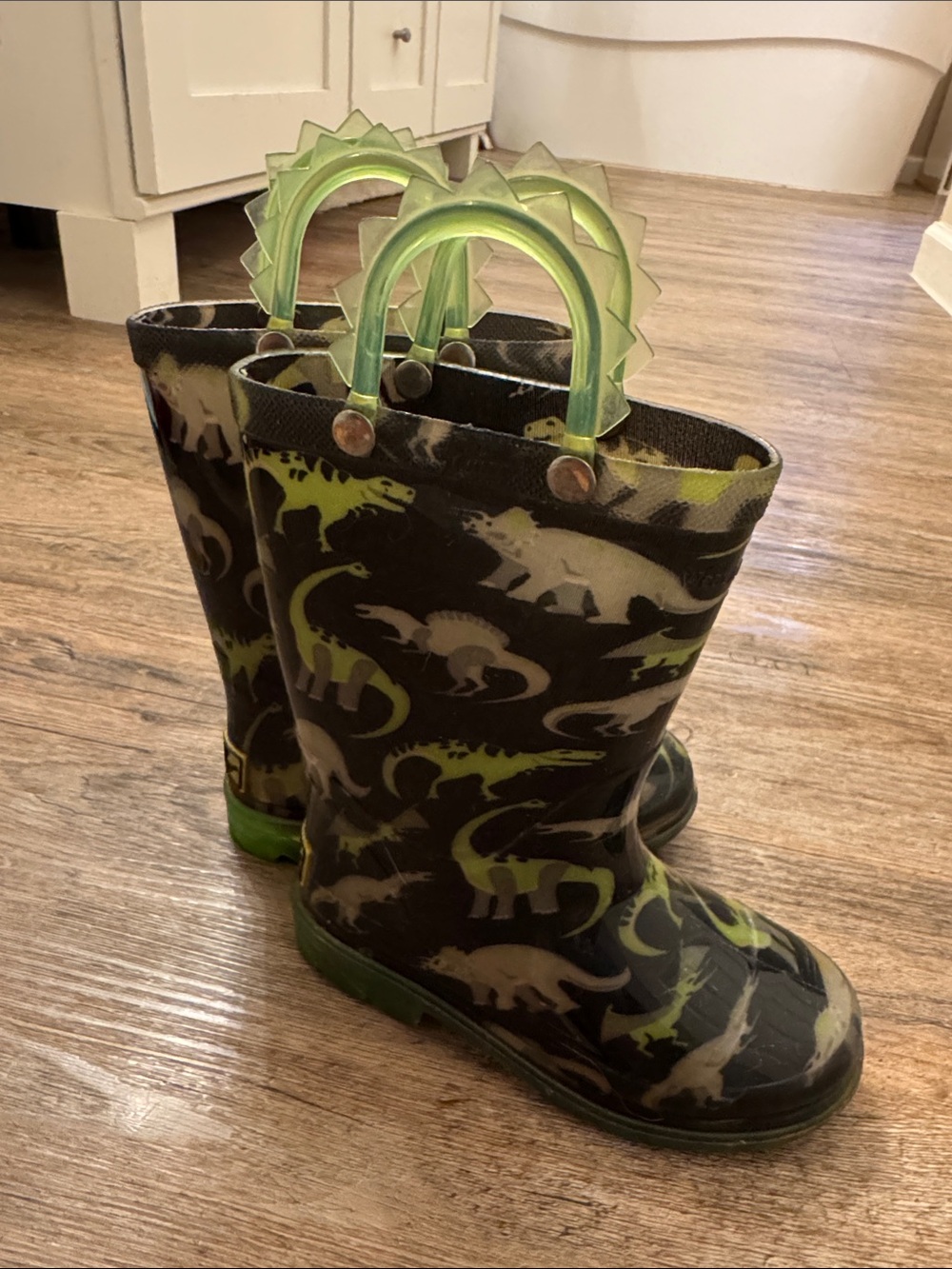 Western Chief LIGHT UP Kids Dinosaur Rain Boots with Spiked Handles